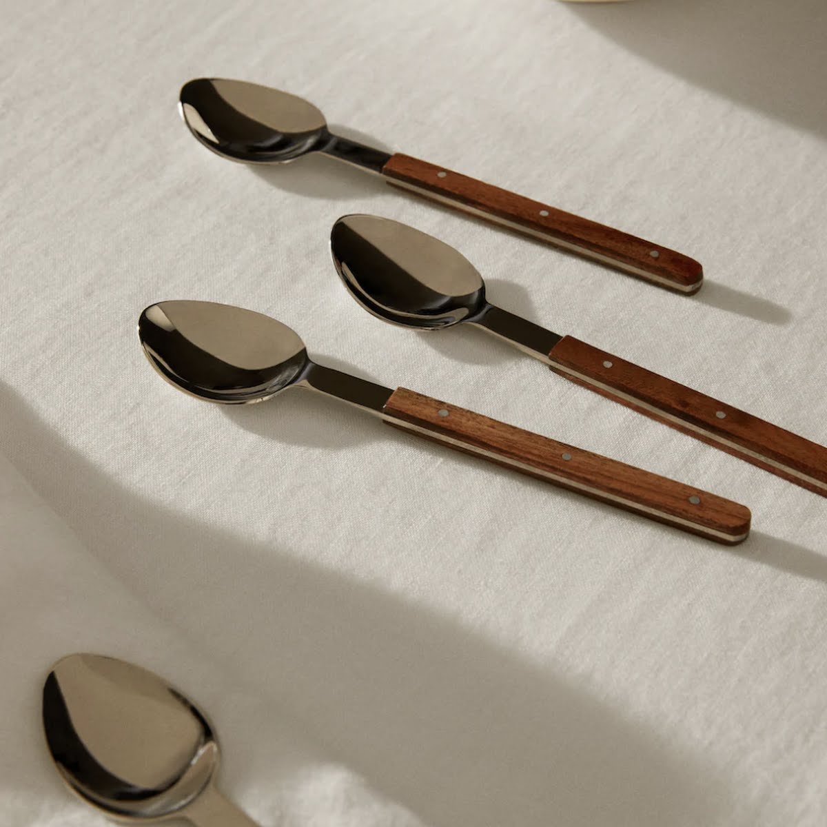 Pack of 4 wooden-handle spoons, €22.99