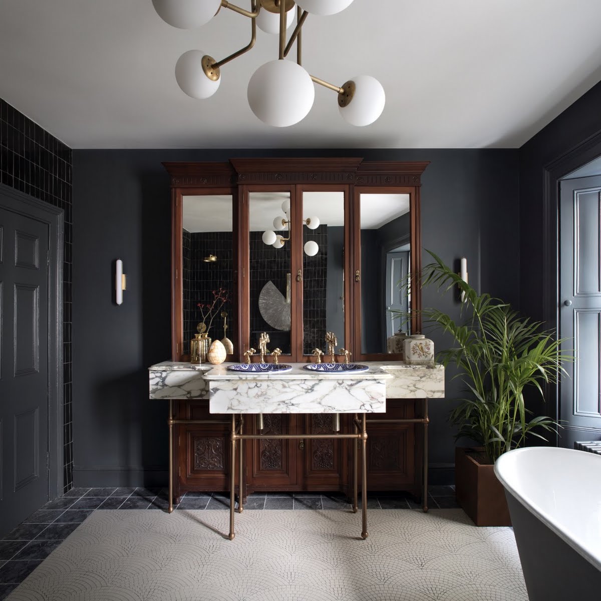 An antique wardrobe has been repurposed into a sink unit in this Galway home. Photo: Barbara Corsico