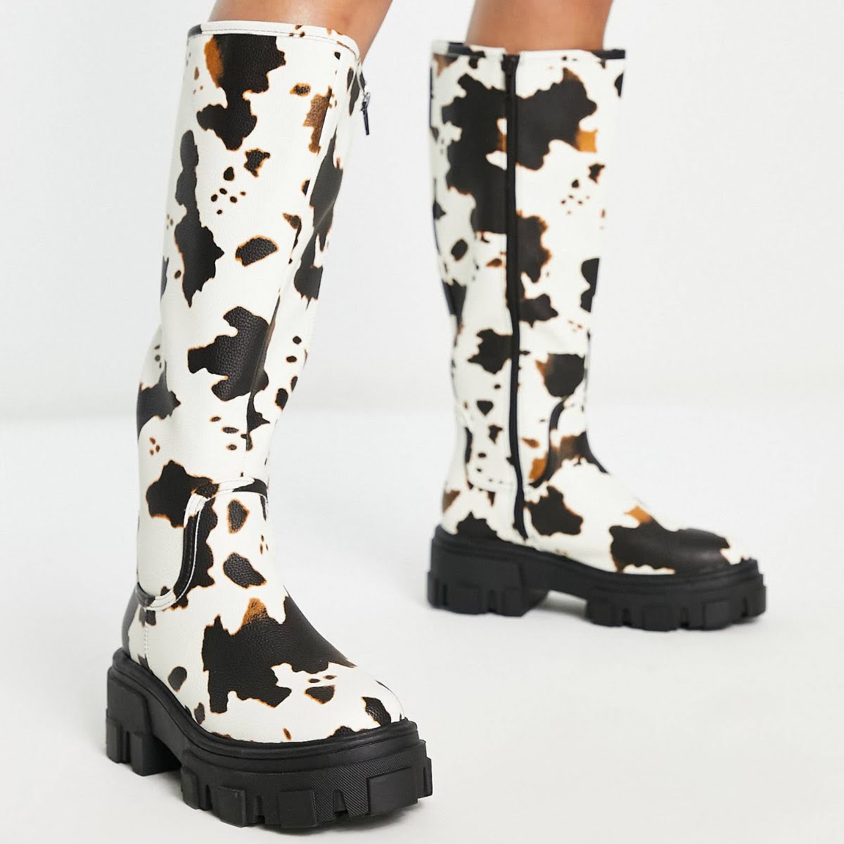 Carla Chunky Flat Knee Boots in Cow Print, €36.59