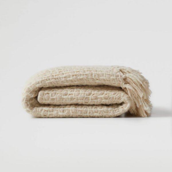 Textured cotton blanket, €49.99, Mango