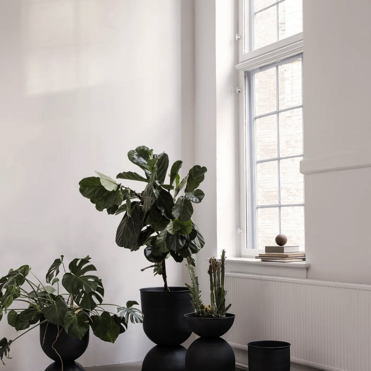 Hourglass plant pot, from €135, Industry & Co