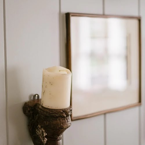 Reclaimed wood wall-mounted candle holder, €25, Amber + Willow