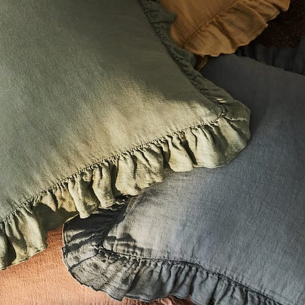 Linen cushion cover with ruffles, €22, Zara Home