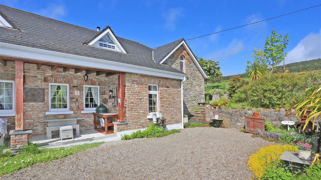 This picturesque cottage with views of the Galtee Mountains is on the