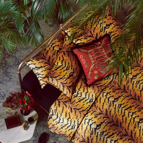 Tibetan Tiger cushion, £43 and Luxe Tiger bed set, from £85