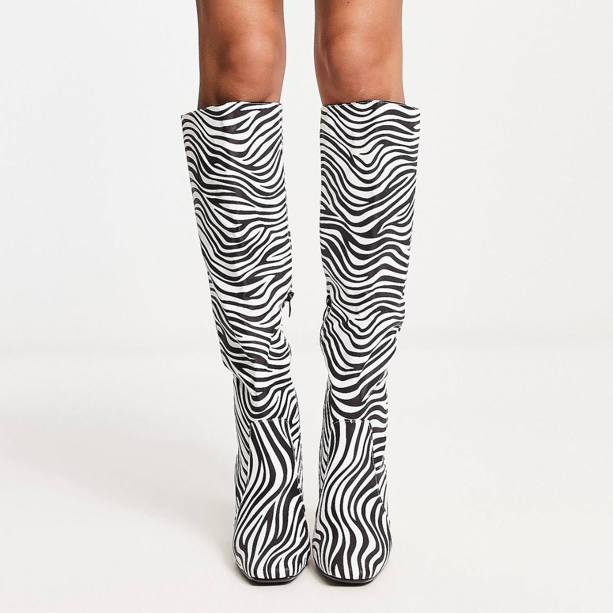 Truffle Collection Square Toe Heeled Knee Boots in Zebra Print, €48.99