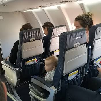 5Air travel with baby: Rosemary MacCabe and her baby on a flight