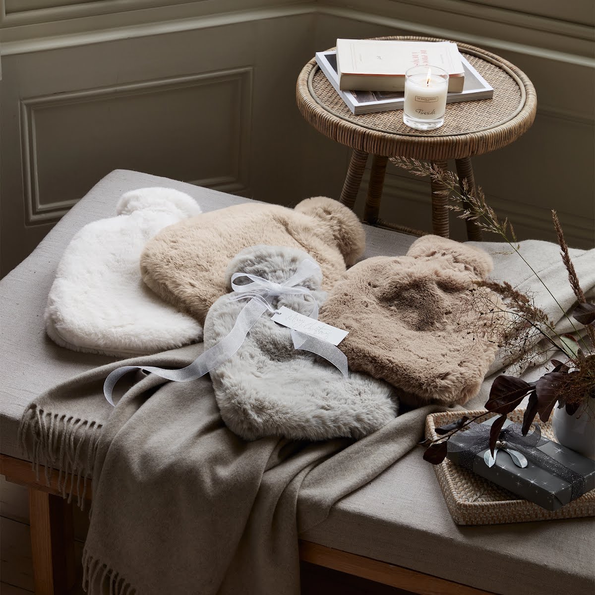 The White Company Super Soft Faux Fur Hot Water Bottle, €36.80
