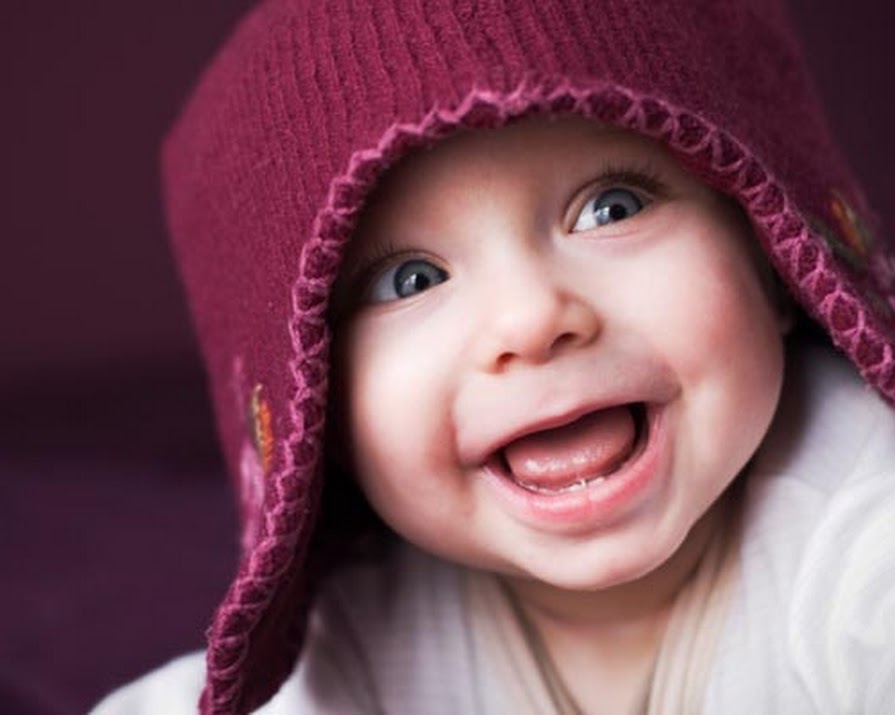 Why does a baby really smile? And is it intentional? Apparently so…
