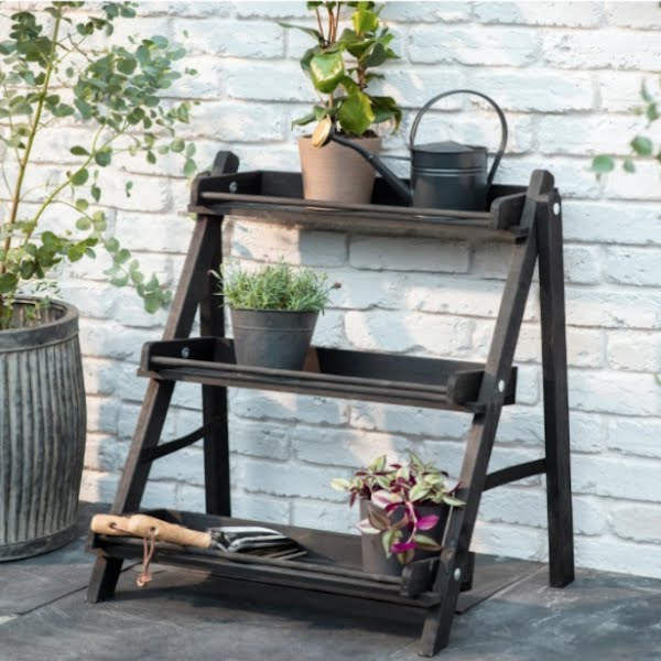 Stained wood plant stand, €169, The Blue Door