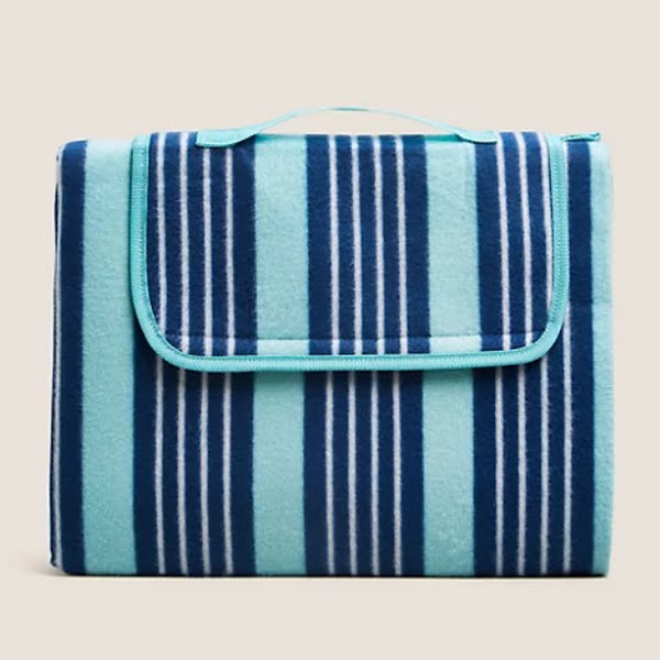 Fold away picnic mat, €13, M&S
