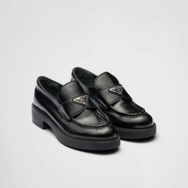Chocolate Brushed Leather Loafers, €920, Prada