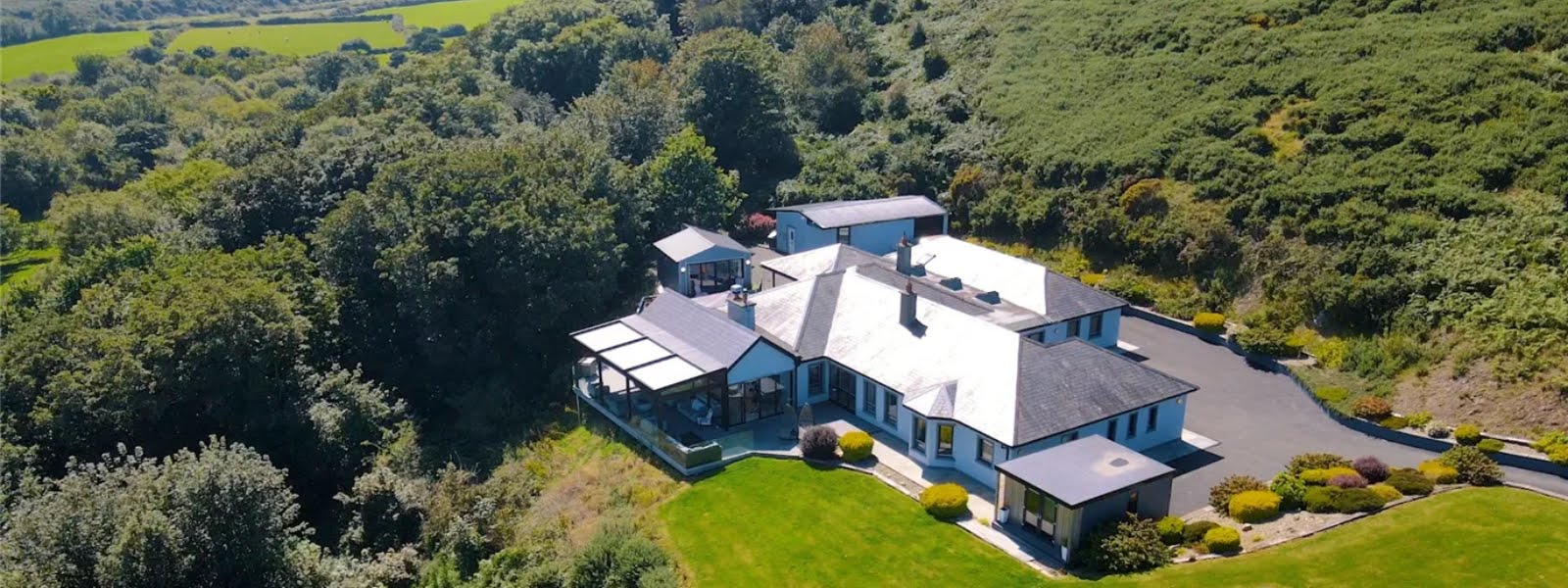 A sheltered patio area with incredible views is the crown jewel of this Waterford home
