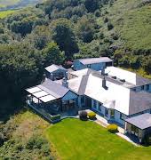 A sheltered patio area with incredible views is the crown jewel of this Waterford home