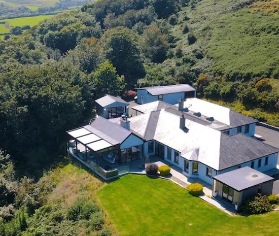 A sheltered patio area with incredible views is the crown jewel of this Waterford home