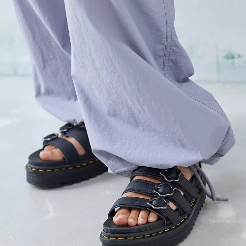 Urban Outfitters, Dr. Martens Blaire Black Flower Slider Sandals, €125