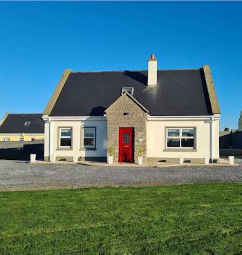 one storey home with red door