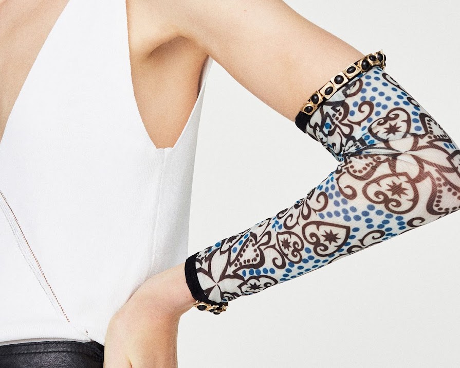 Wait, what? Are weird arm warmers still a thing in 2018?