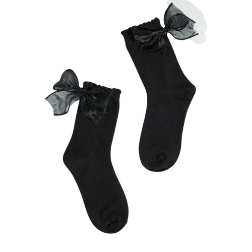 Out From Under Big Bow Socks, €9, Urban Outfitters