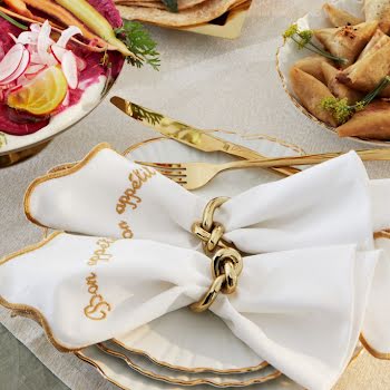 14 sets of embroidered napkins to add some whimsy to your next picnic
