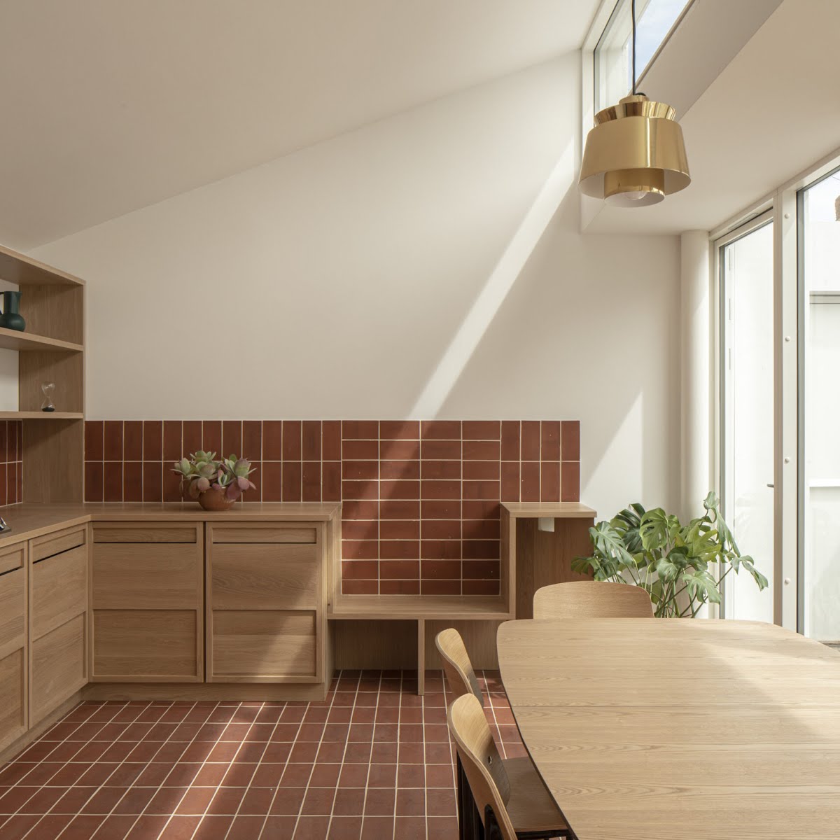 Jack O Kelly Architect used brick tiles to give character to this kitchen