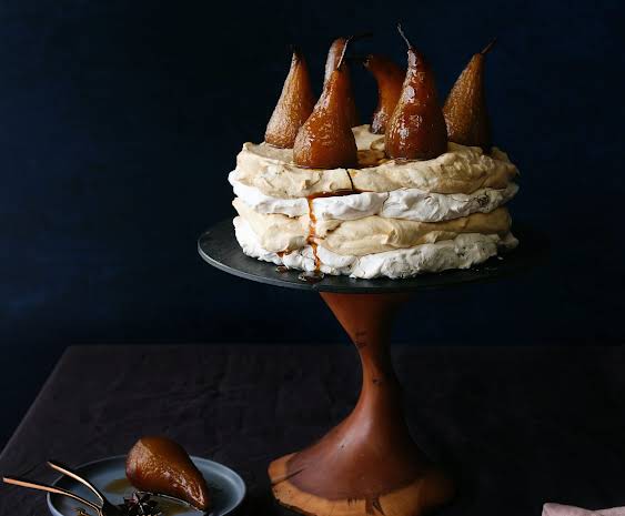 Coffee and walnut pavlova with coffee poached pears, Bake by Graham Herterich (Pic Joanne Murphy Photography)