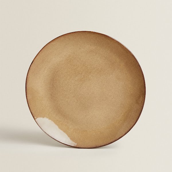 Irregular stoneware dinner plate, €11.99, Zara Home