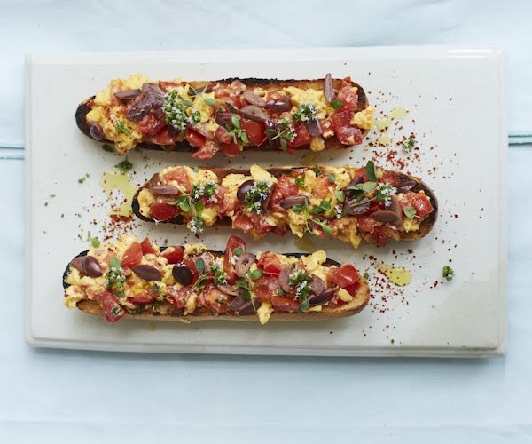 What to make this weekend: Tomato toast with scrambled eggs, herbs and olives