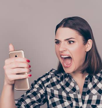 Angry woman disappointed with the news via text message