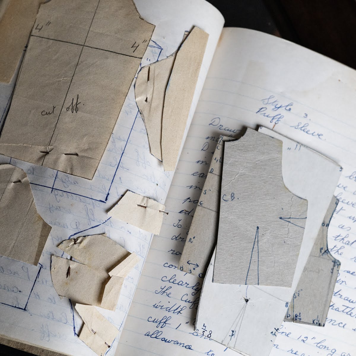 Ruth O’Connor explores her mother's old fashion journals. Photo: Marlene Wessels