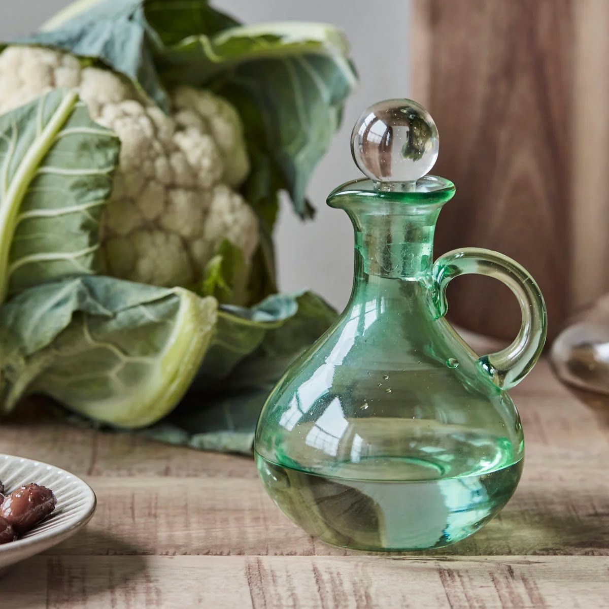 Green glass carafe, €13, April and the Bear