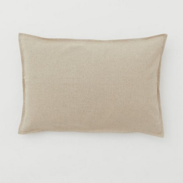 Linen-blend cushion cover, €12.99, H&M