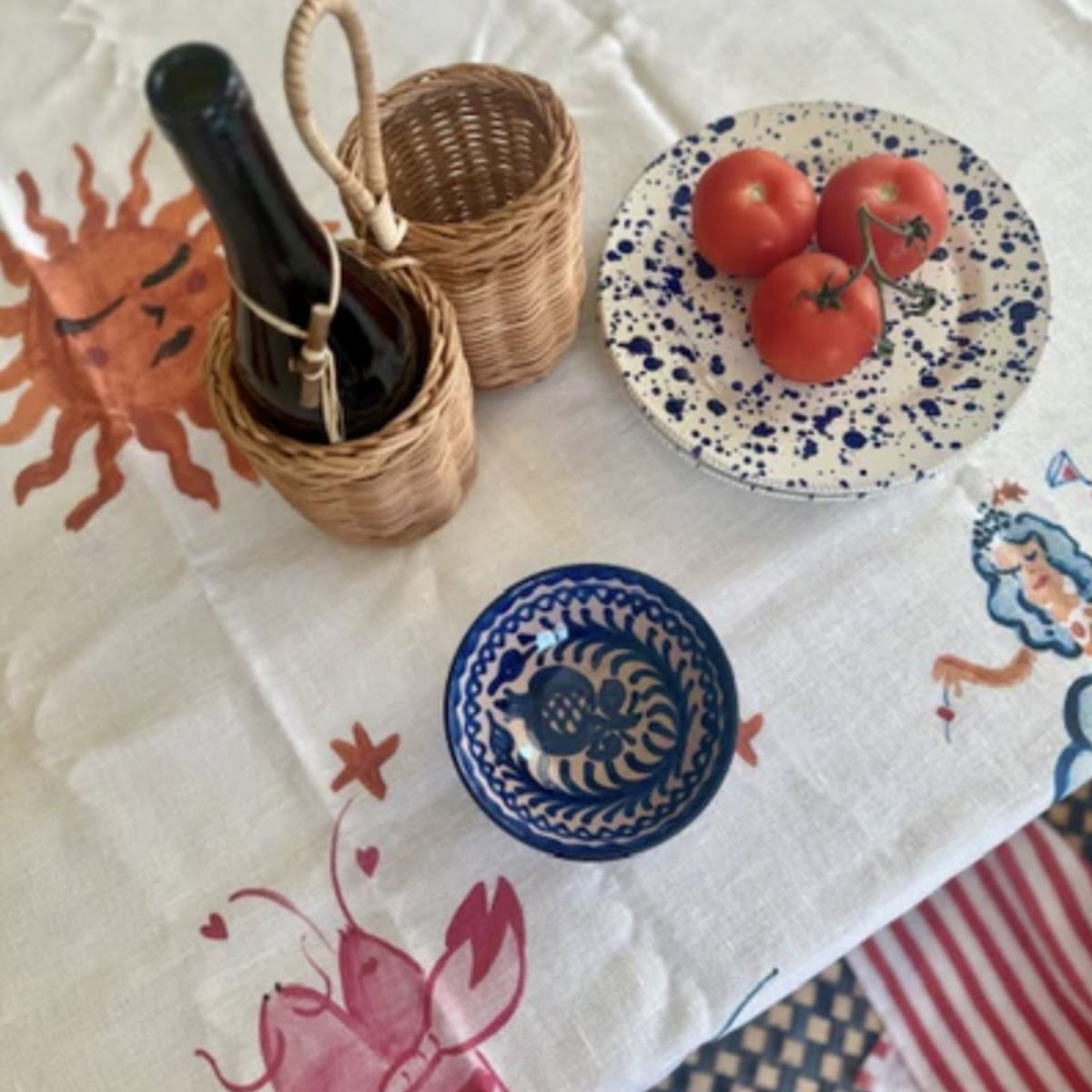 Hand painted tablecloth, €285, Amber + Willow