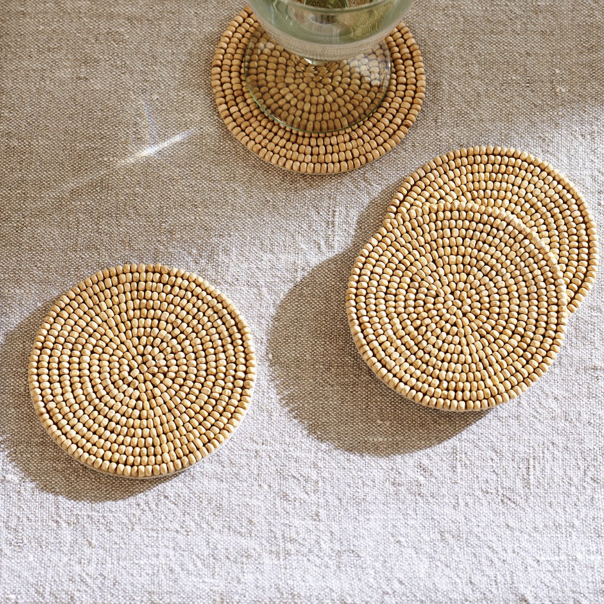Austell Wooden Beaded Coasters Set of 4, €37, The White Company