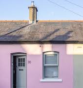 This adorable Portobello cottage has been reconfigured to create extra space and filled with colour