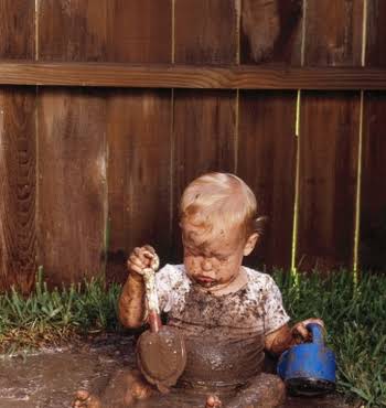 Baby playing in dirt