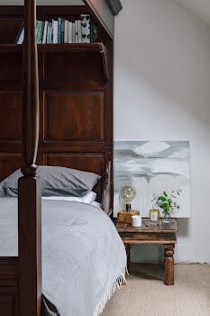 The bed was Richard’s in London and it’s made of French oak. “It’s a lovely piece but I personally wanted something slightly different, although I do love it. He likes dark woods and I like lighter styles, so we compromise on things like that and sometimes nobody listens,” Joan laughs. Photography by Shantanu Starick, Styling by Ciara O’Halloran
