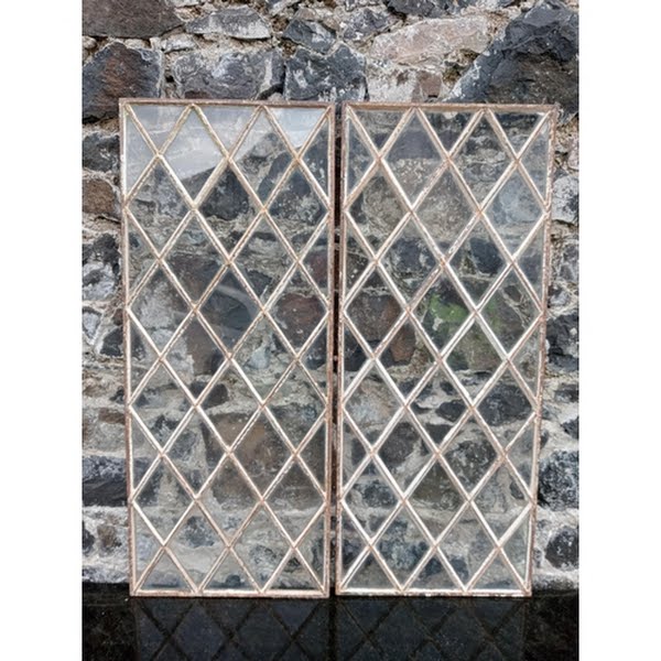 Pair of cast iron glazed windows, estimate €150 - €250