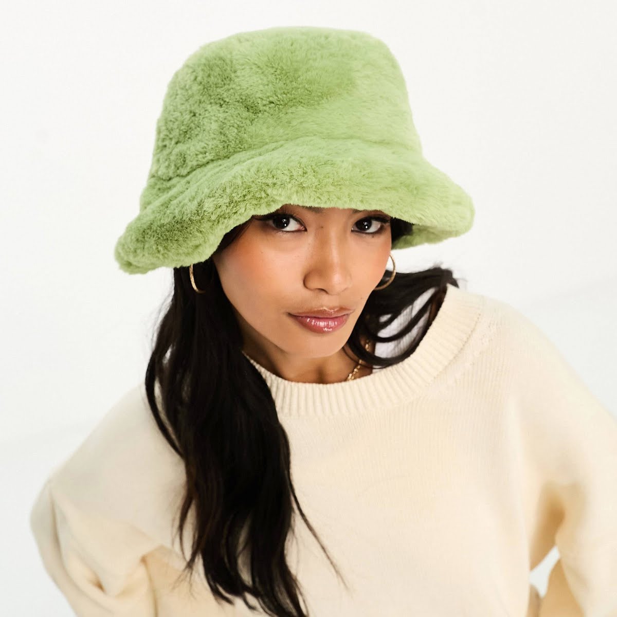 ASOS Design Faux Fur Bucket Hat in Green, €10