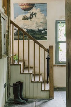 Farrow & Ball’s Cooking Apple Green adorns the staircase. Photography by Shantanu Starick, Styling by Ciara O’Halloran