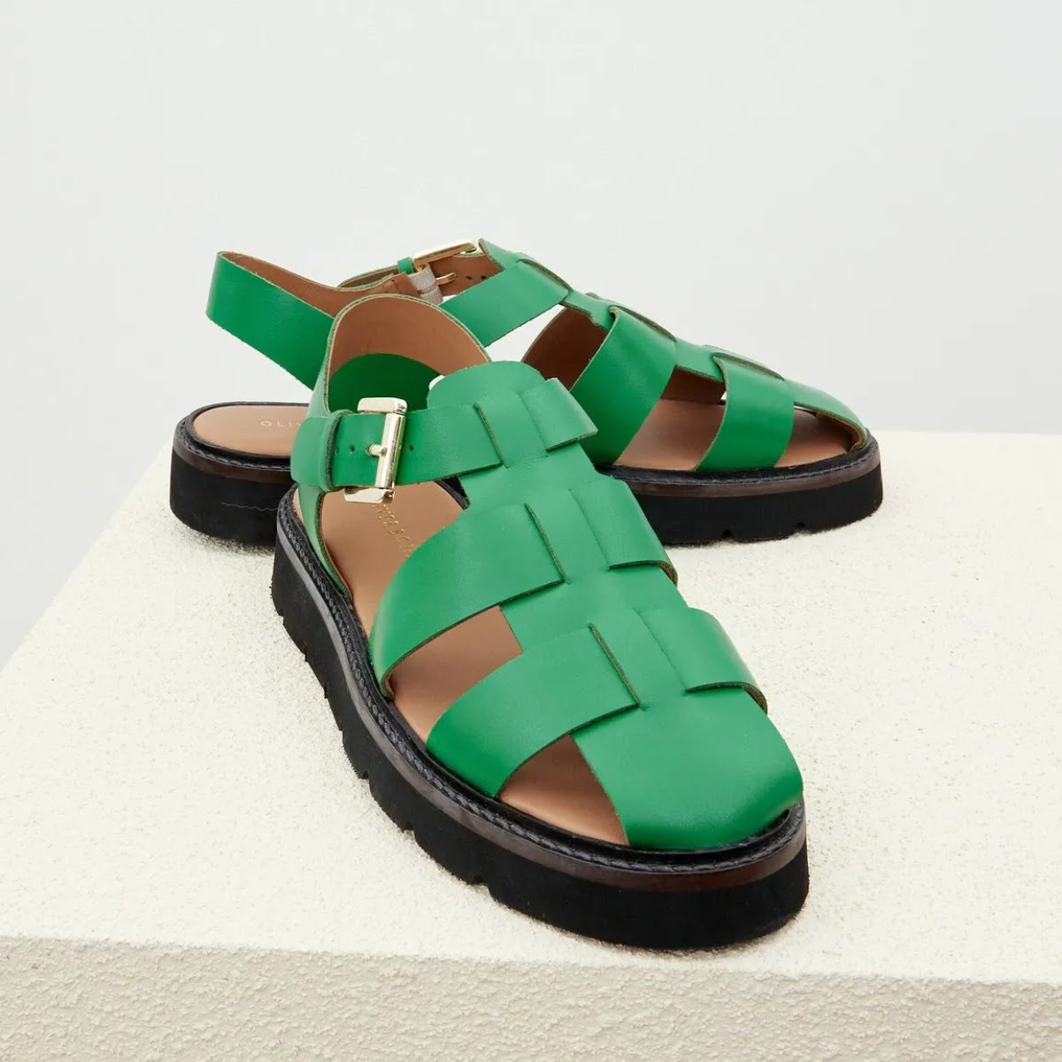 Fisherman Green Leather Sandals, €84, Oliver Bonas